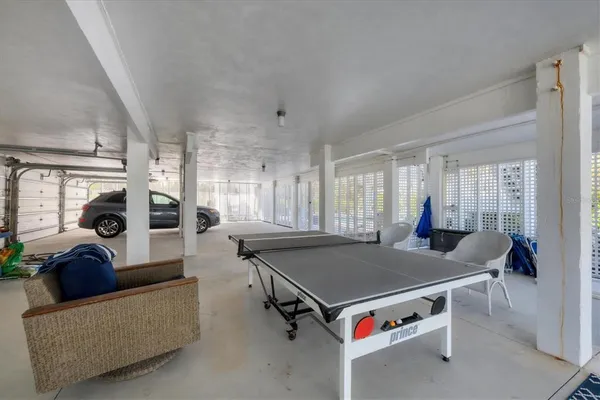 a living room with furniture and a table