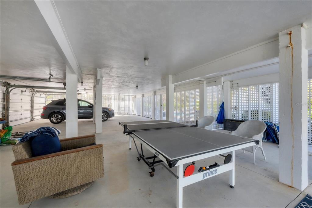 355 Barbarossa Street Boca Grande, FL 33921 - Photo 32 of 47 a living room with furniture and a table