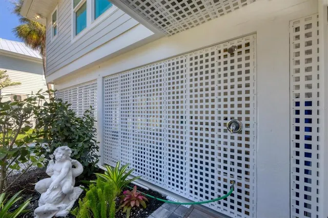 a view of a balcony with a potted plant
