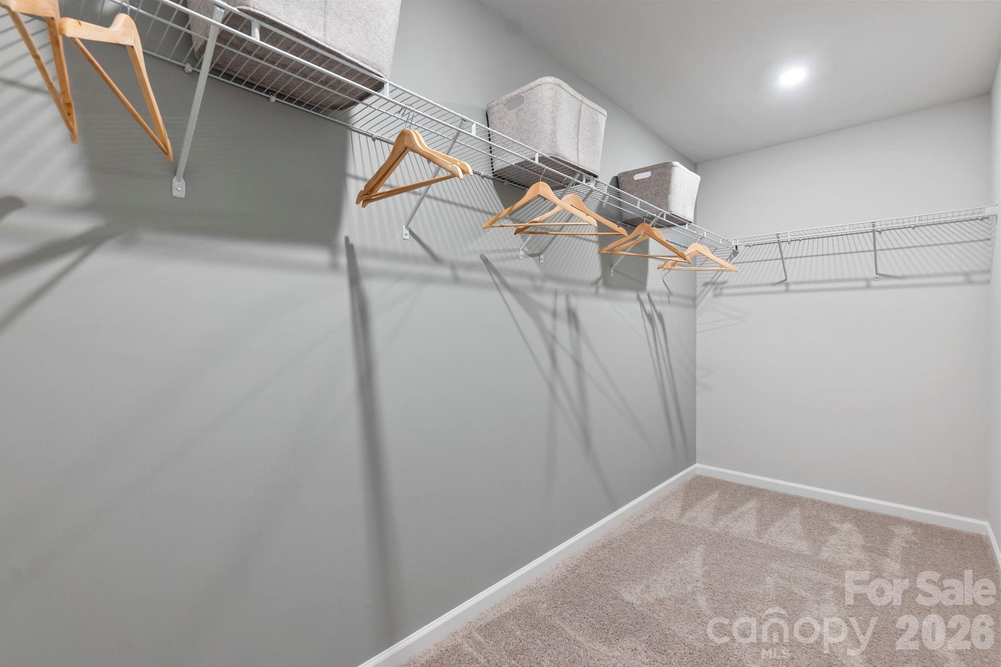 8034 Midas Lane Locust, NC 28097 - Photo 19 of 27 a view of a room with racks on the wall