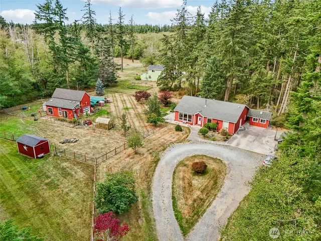 swimming pool view with a seating space