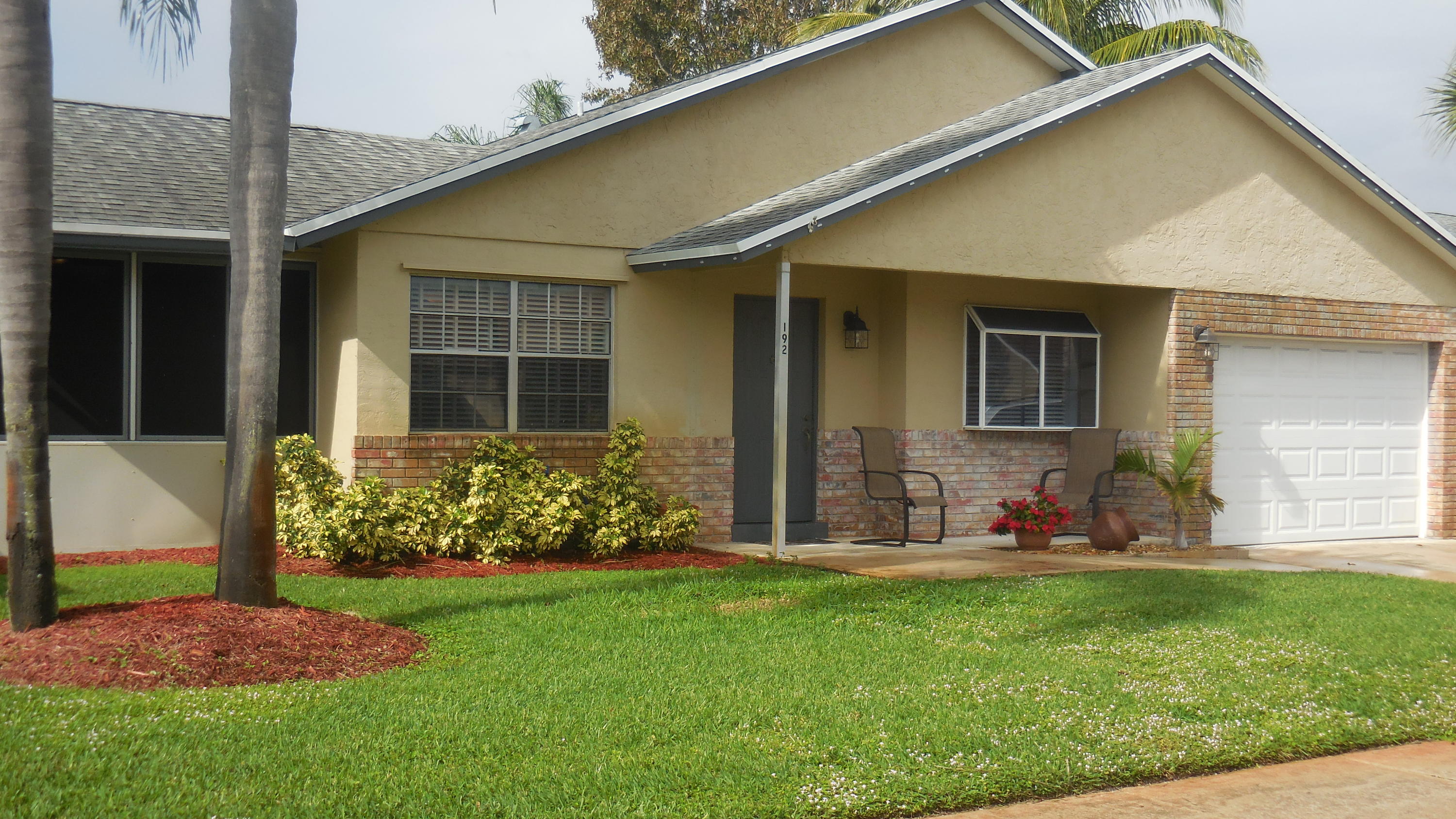 192 Raintree Trail Jupiter, FL 33458 - Photo 1 of 29 FRONT OF HOUSE