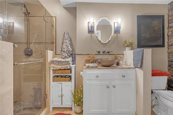 a bathroom with a sink and a mirror