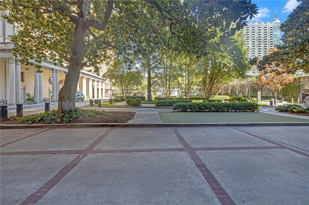 30 5th Street Northeast, Unit 102 Atlanta, GA 30308 - Photo 22 of 25 front view of a house with a street