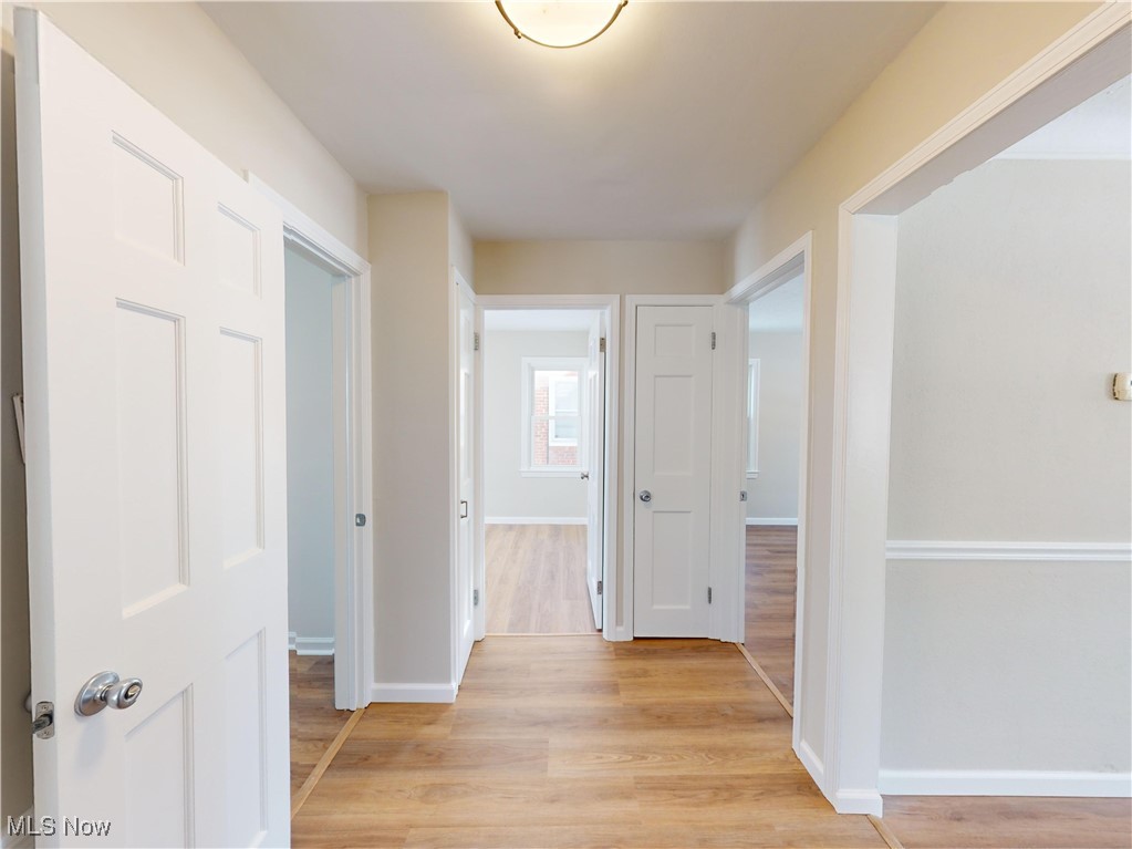 1343 Irene Road Lyndhurst, OH 44124 - Photo 9 of 32 Corridor with light hardwood / wood-style floors