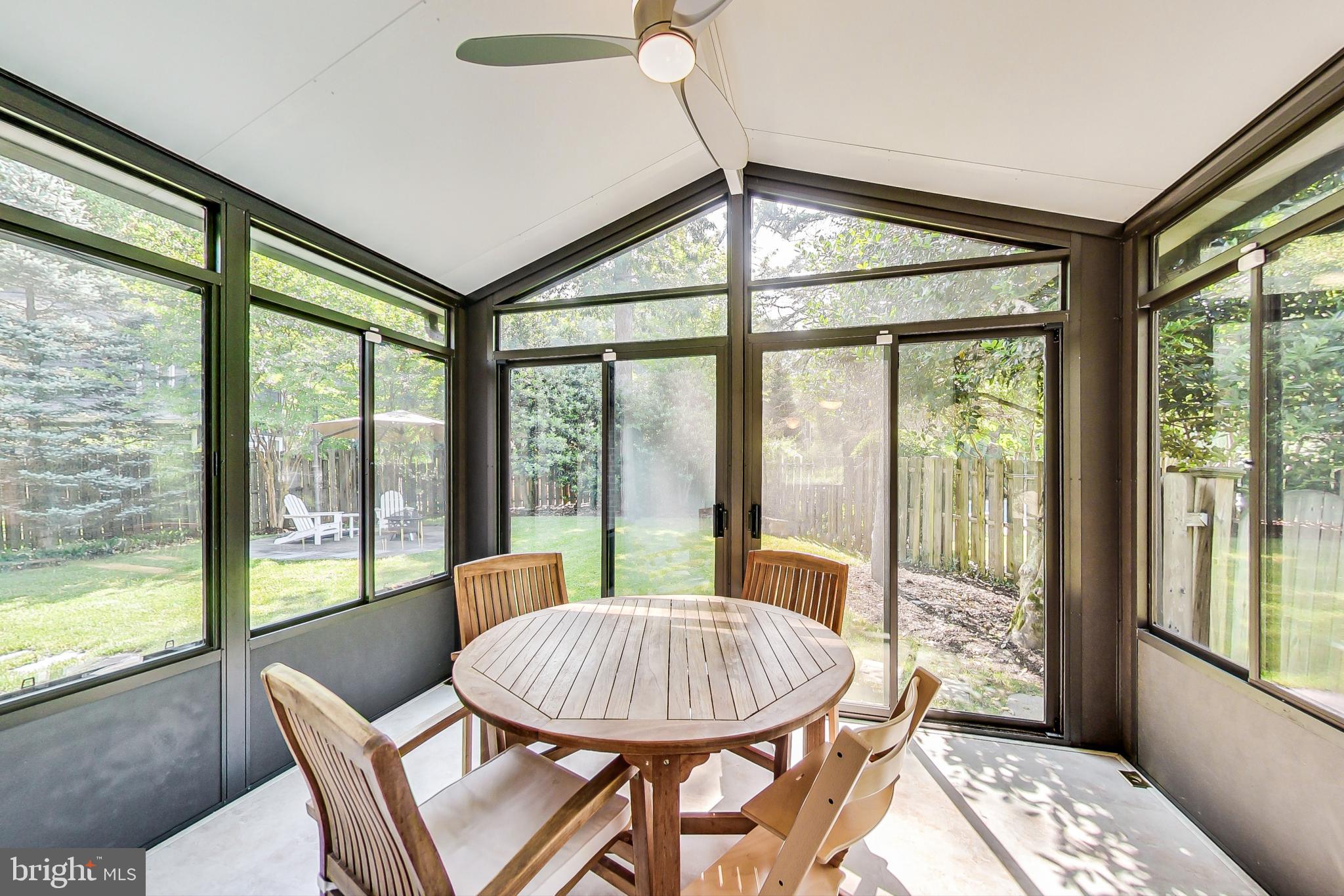 6515 East Halbert Road Bethesda, MD 20817 - Photo 19 of 42 a view of a dining room with furniture window and outside view