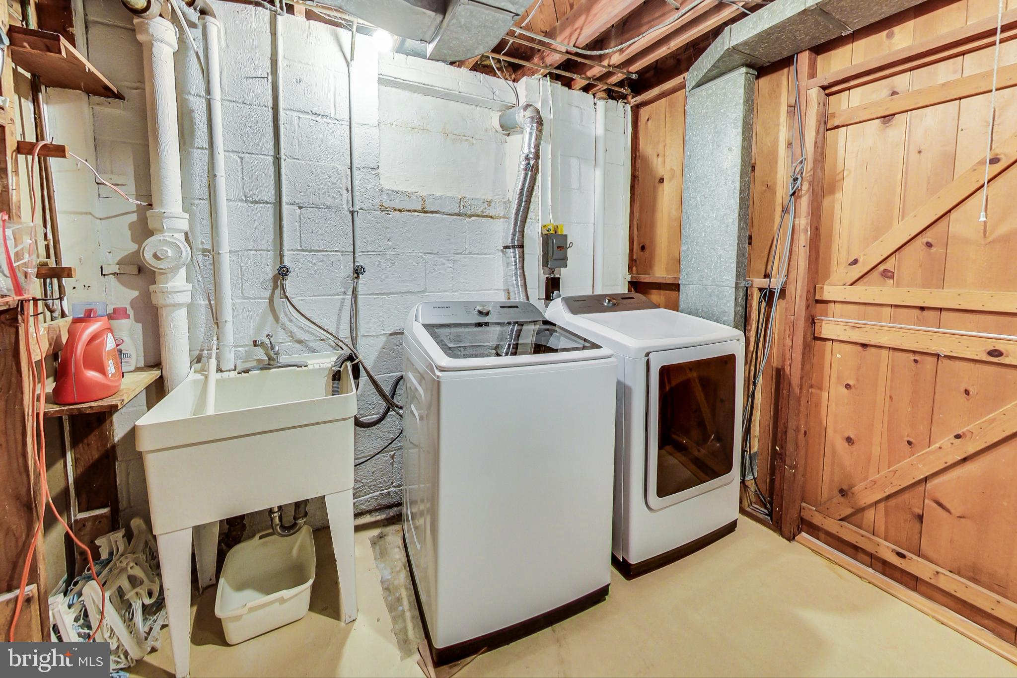 6515 East Halbert Road Bethesda, MD 20817 - Photo 20 of 42 a utility room with dryer and washer