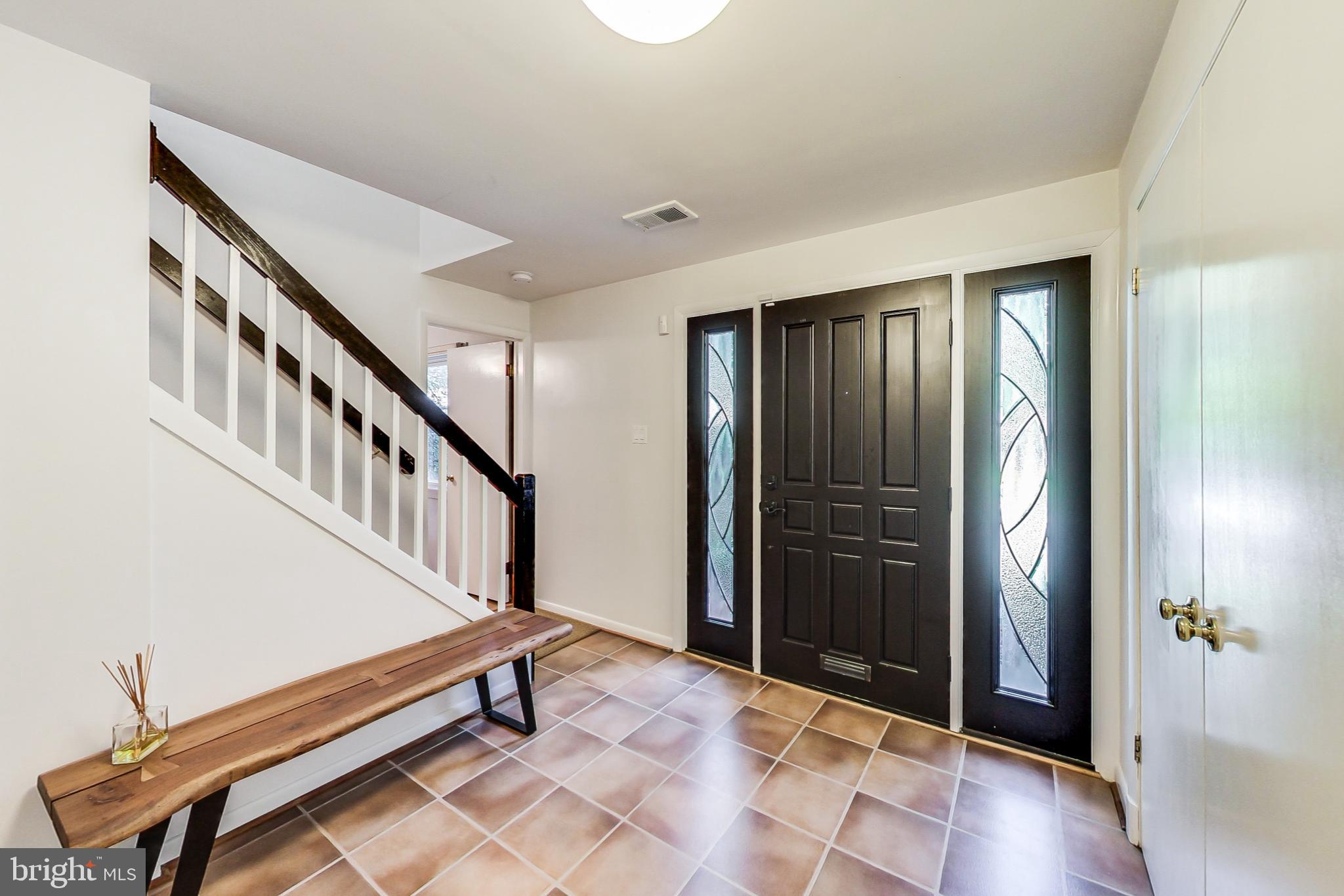 6515 East Halbert Road Bethesda, MD 20817 - Photo 2 of 42 a view of an entryway with wooden floor