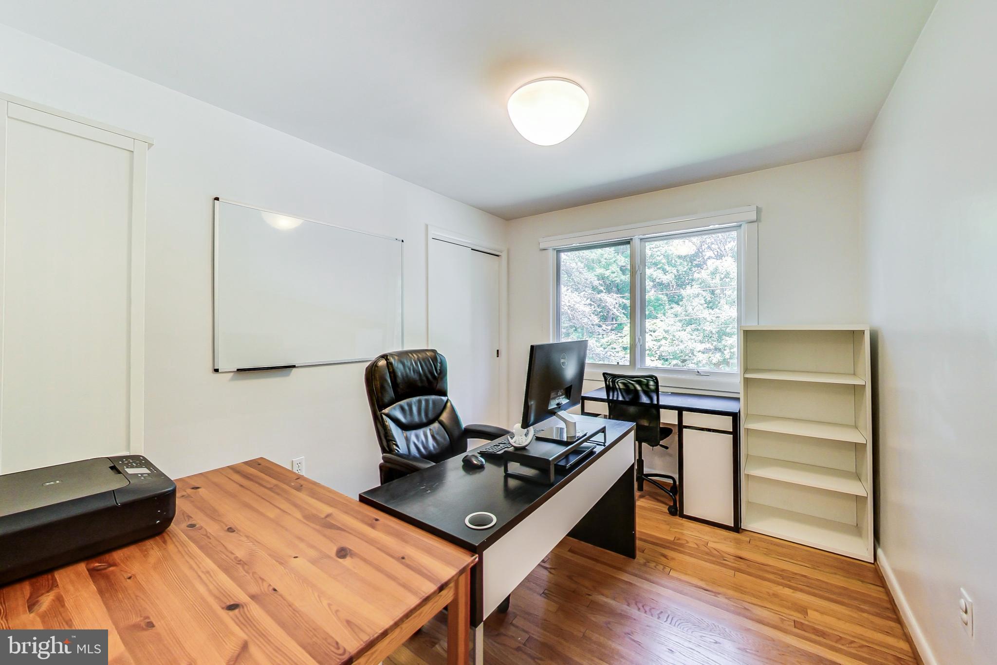 6515 East Halbert Road Bethesda, MD 20817 - Photo 30 of 42 a living room with furniture