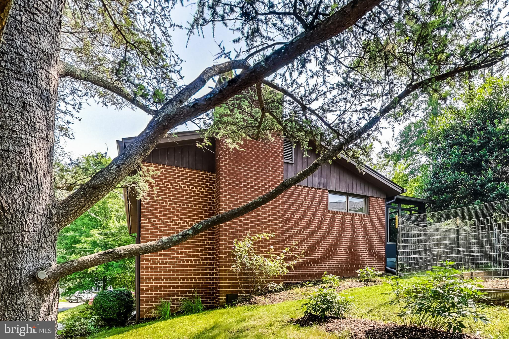 6515 East Halbert Road Bethesda, MD 20817 - Photo 33 of 42 a backyard of a house with lots of green space