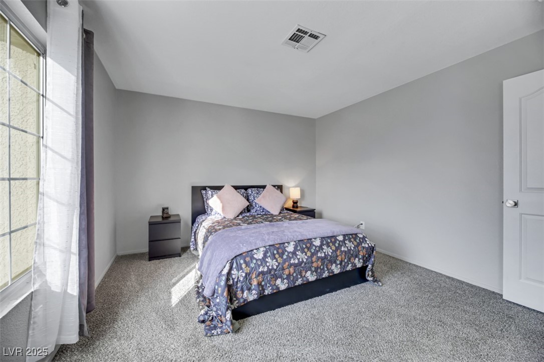 2907 Rio Sonora Court Henderson, NV 89074 - Photo 31 of 35 Bedroom featuring carpet floors