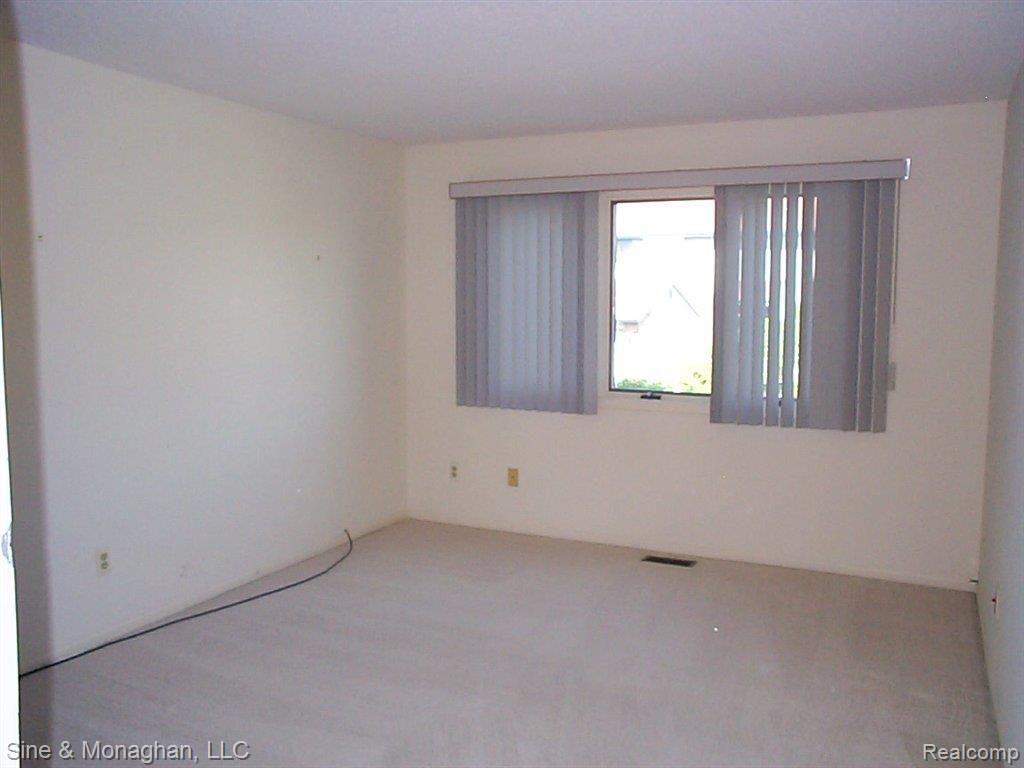 1715 River Road, Unit 82 St. Clair, MI 48079 - Photo 14 of 24 14 Guest Bedroom 1715 N River #8