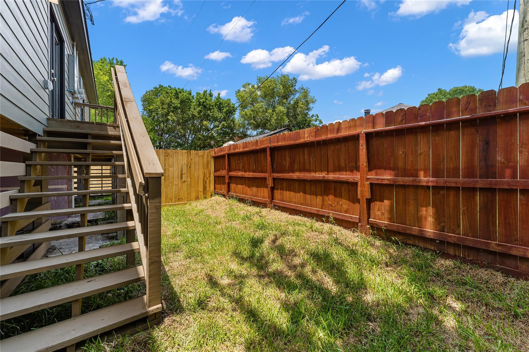 5218 Jezebel Street, Unit B Houston, TX 77033 - Photo 30 of 31 a view of a backyard