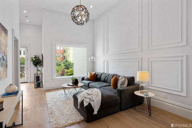 a bed room with a bed and a lamp