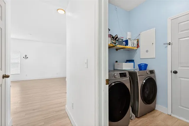 a utility room with dryer and washer