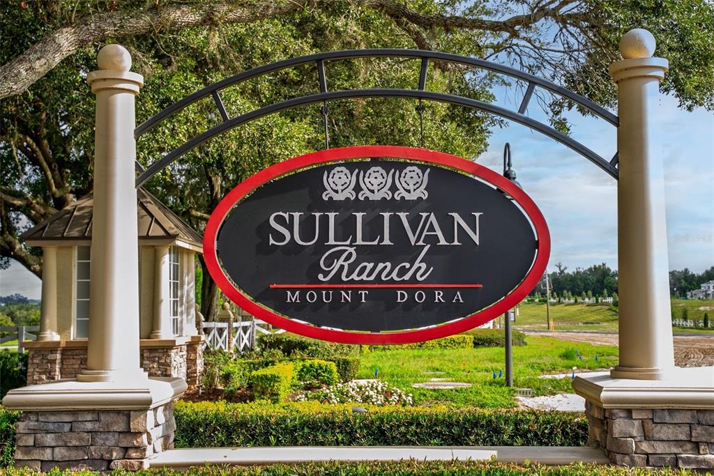 20930 Sullivan Ranch Boulevard Mount Dora, FL 32757 - Photo 41 of 41 a sign on the side of a building
