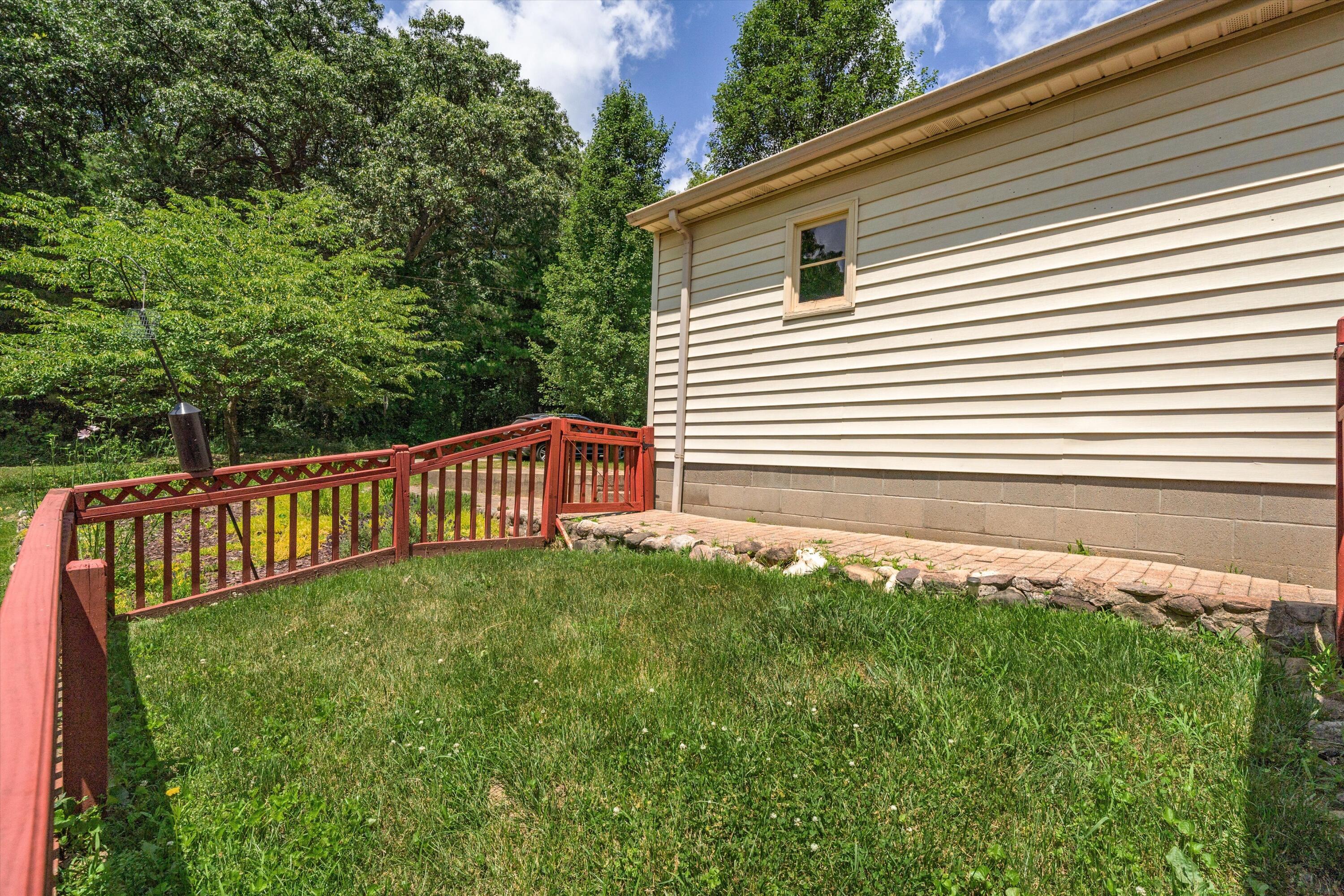 16009 Cavanaugh Lake Road Chelsea, MI 48118 - Photo 46 of 56 Fenced in area off deck