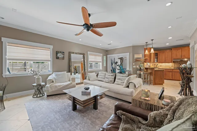 a kitchen with stainless steel appliances granite countertop a sink a stove and cabinets