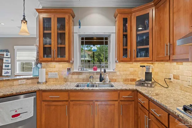 a bathroom with a granite countertop sink mirror and a