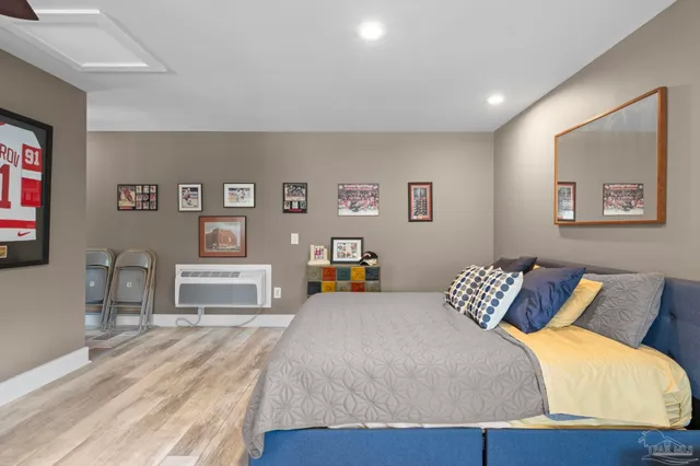 a living room with furniture window and flat screen tv