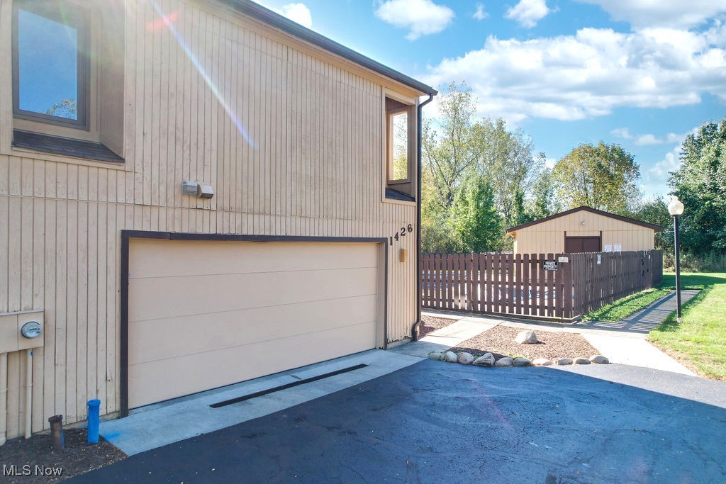 1426 Loop Road, Unit 1426 Kent, OH 44240 - Photo 26 of 40 Garage with asphalt driveway