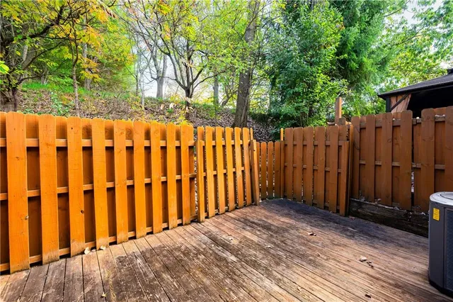 a view of a wooden fence