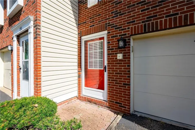 a view of a house with a large window