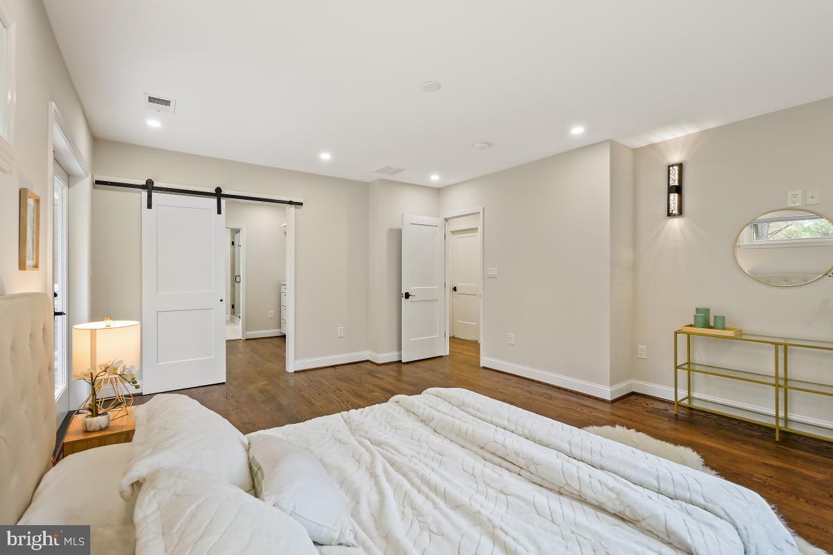7508 Piney Branch Road Silver Spring, MD 20910 - Photo 16 of 44 Spacious Primary Bedroom with a Barn Door