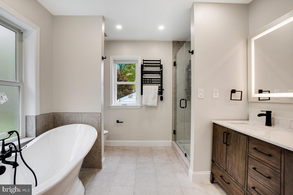 7508 Piney Branch Road Silver Spring, MD 20910 - Photo 18 of 44 Luxurious Primary Bath with a Soaking Tub