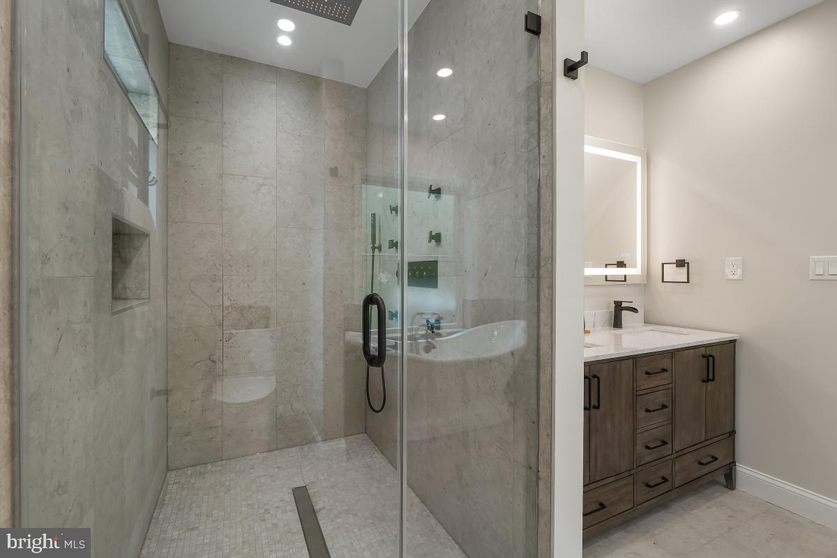 7508 Piney Branch Road Silver Spring, MD 20910 - Photo 19 of 44 Primary Bath Glass Enclosed Shower