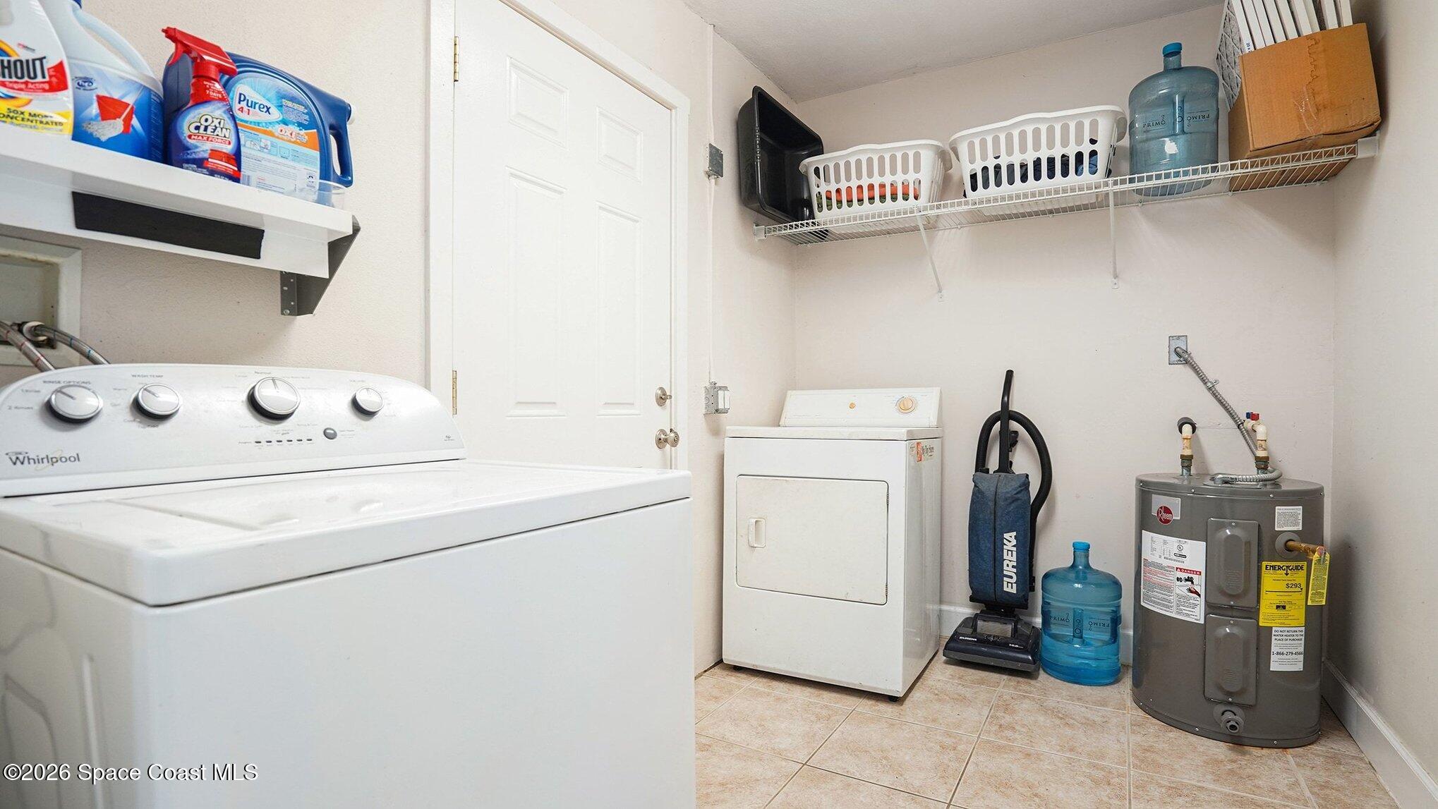 136 Gray Road Melbourne, FL 32904 - Photo 23 of 27 a utility room with dryer and washer