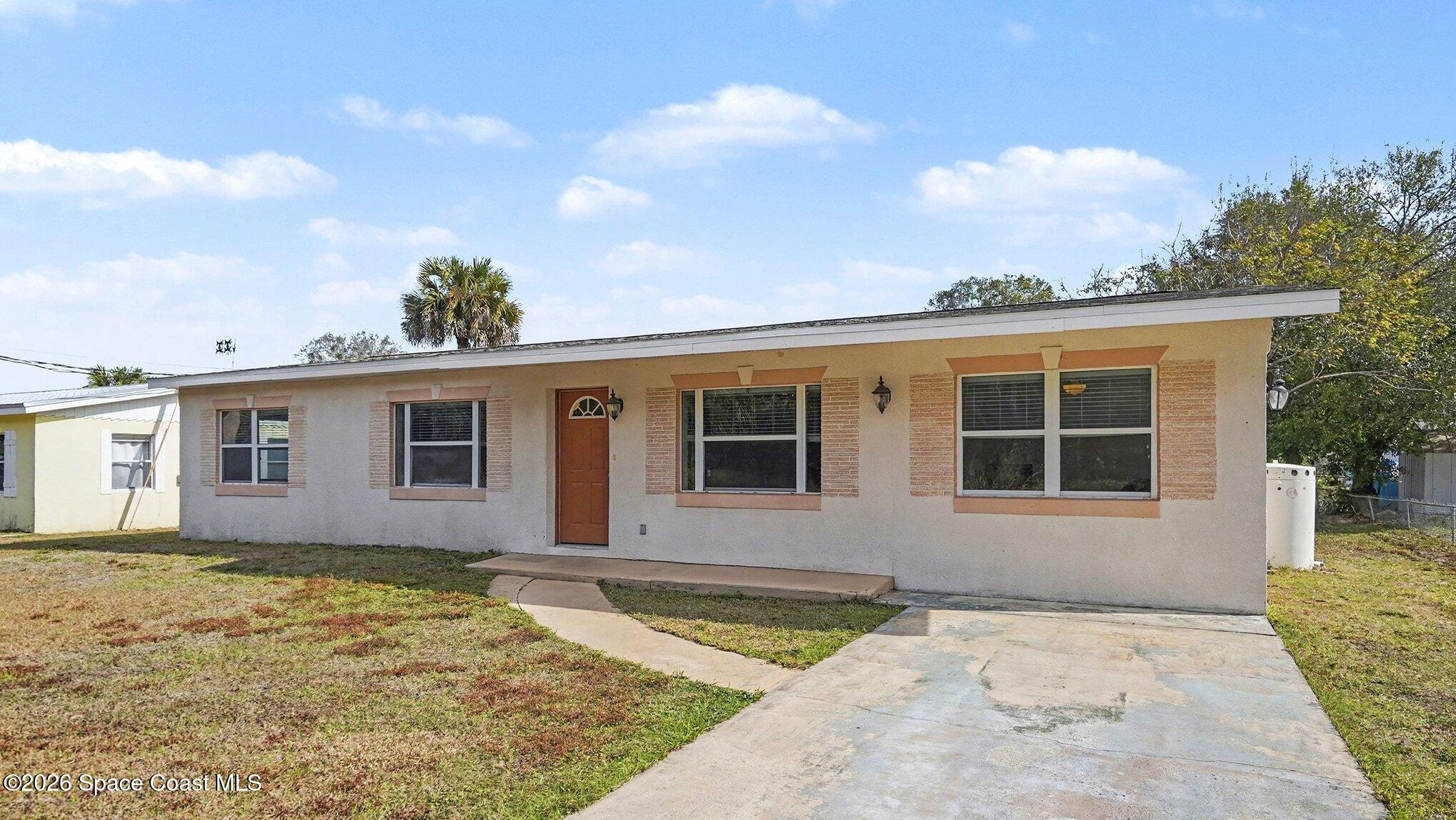 136 Gray Road Melbourne, FL 32904 - Photo 4 of 27 front view of a house