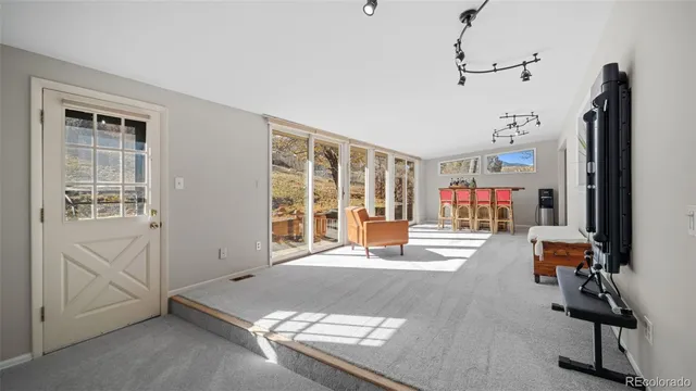 a bed room with a bed and a window