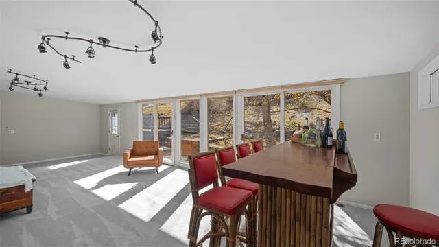 a view of a workspace with furniture