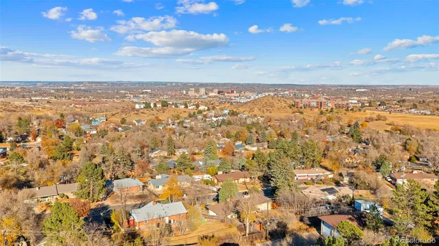 a view of a large building in the middle of a city