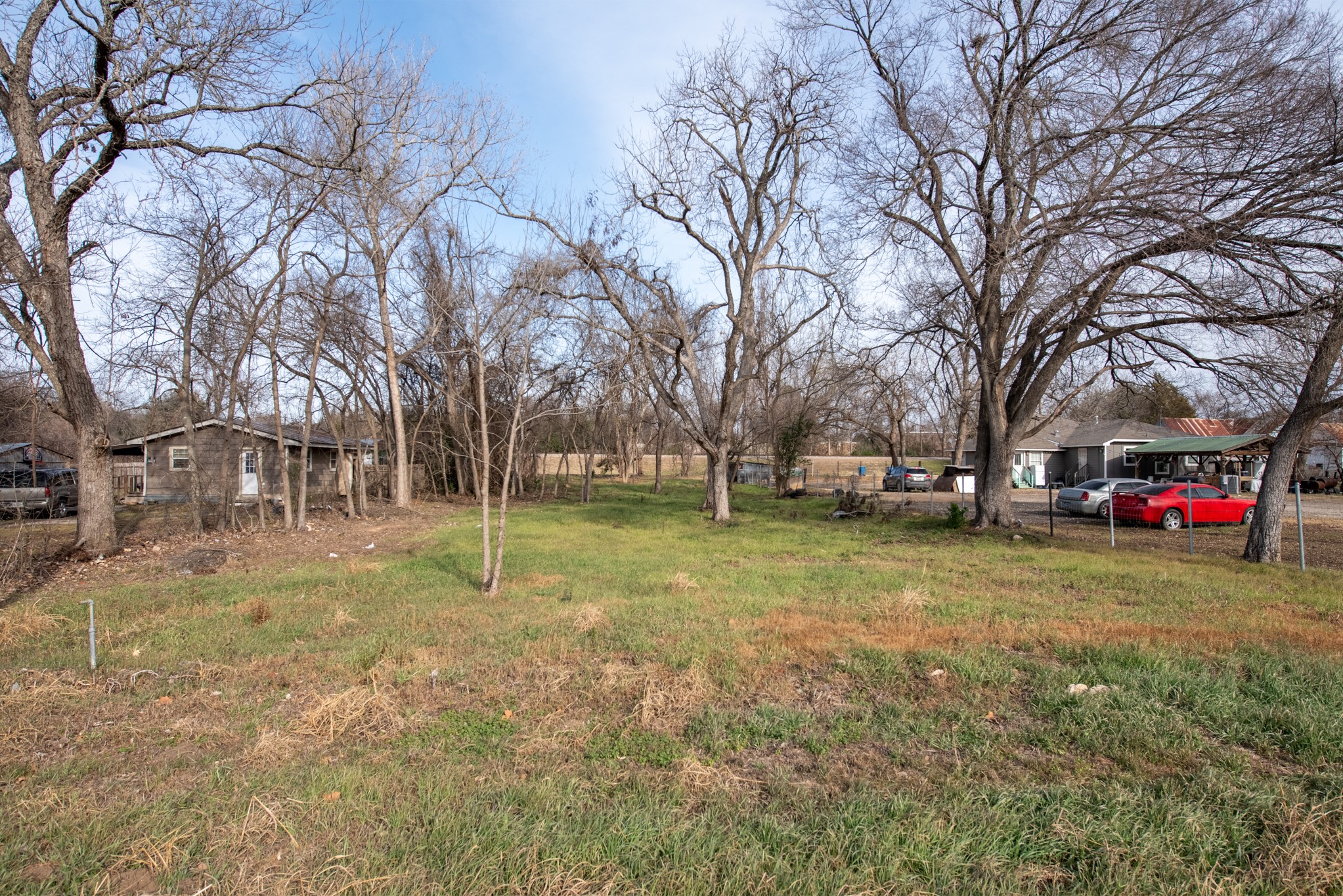 418 South Ave D Elgin, TX 78621 - Photo 1 of 29 a view of street with trees