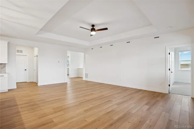 a view of a house with a backyard porch and sitting area