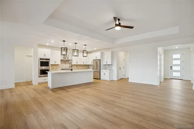 a view of a chairs and table in the patio