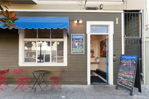 a view of a house with a street