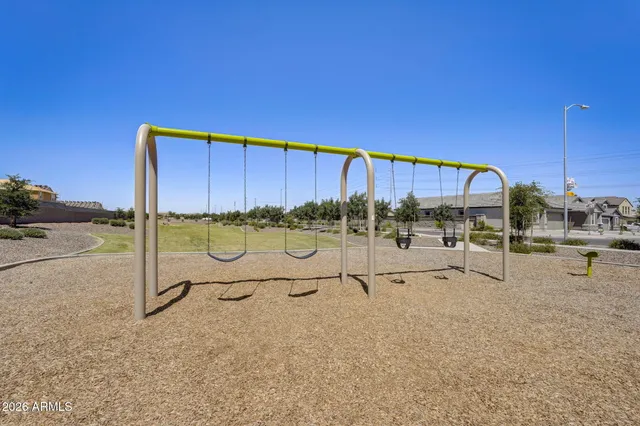 a view of flowing water with large building in front of it