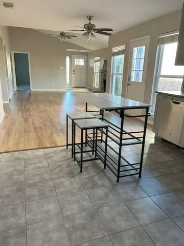 a view of a livingroom with furniture and window