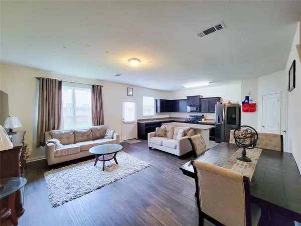 a living room with furniture and a couch
