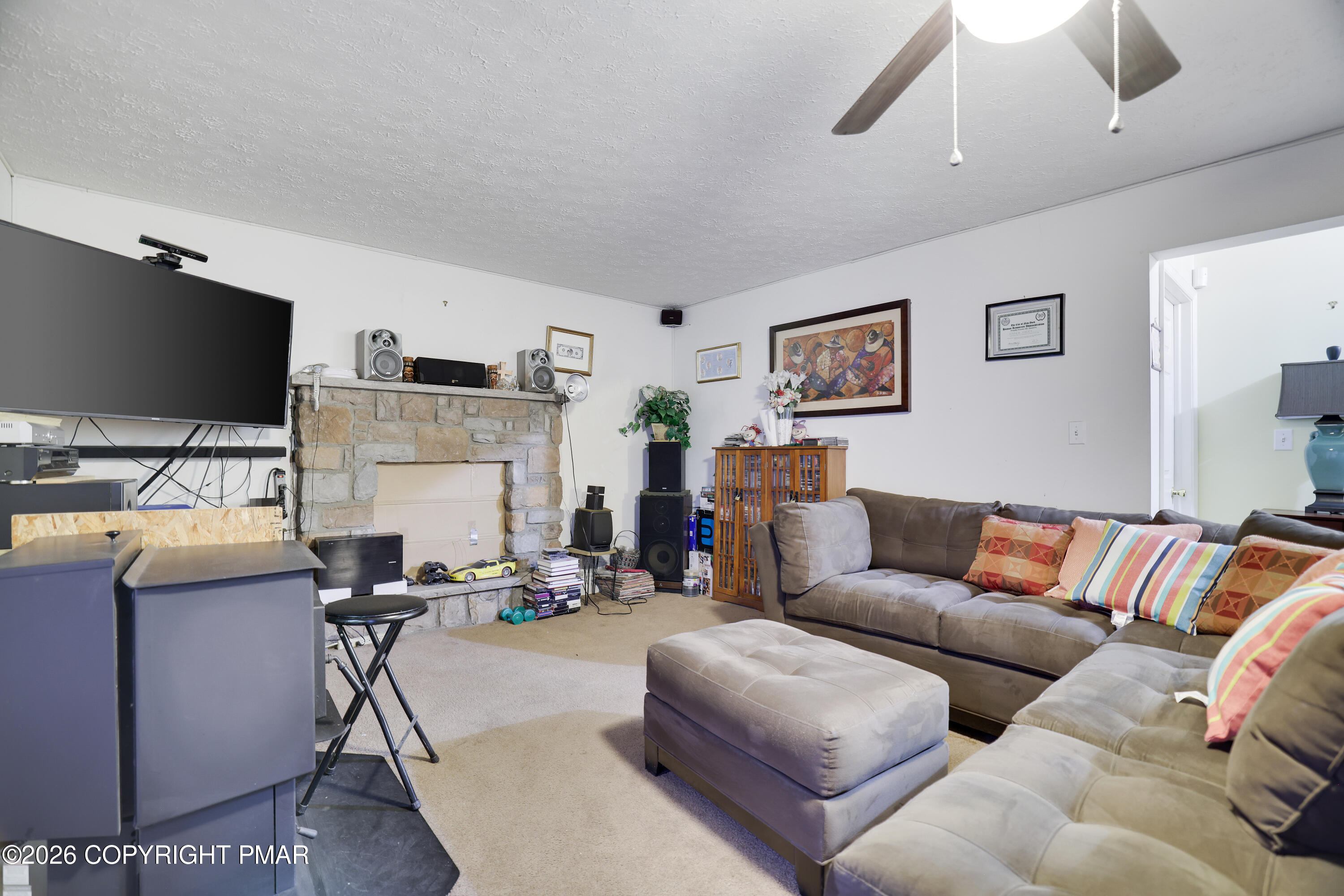 2137 Freedom Way Pocono Summit, PA 18346 - Photo 25 of 71 a living room with furniture and a flat screen tv