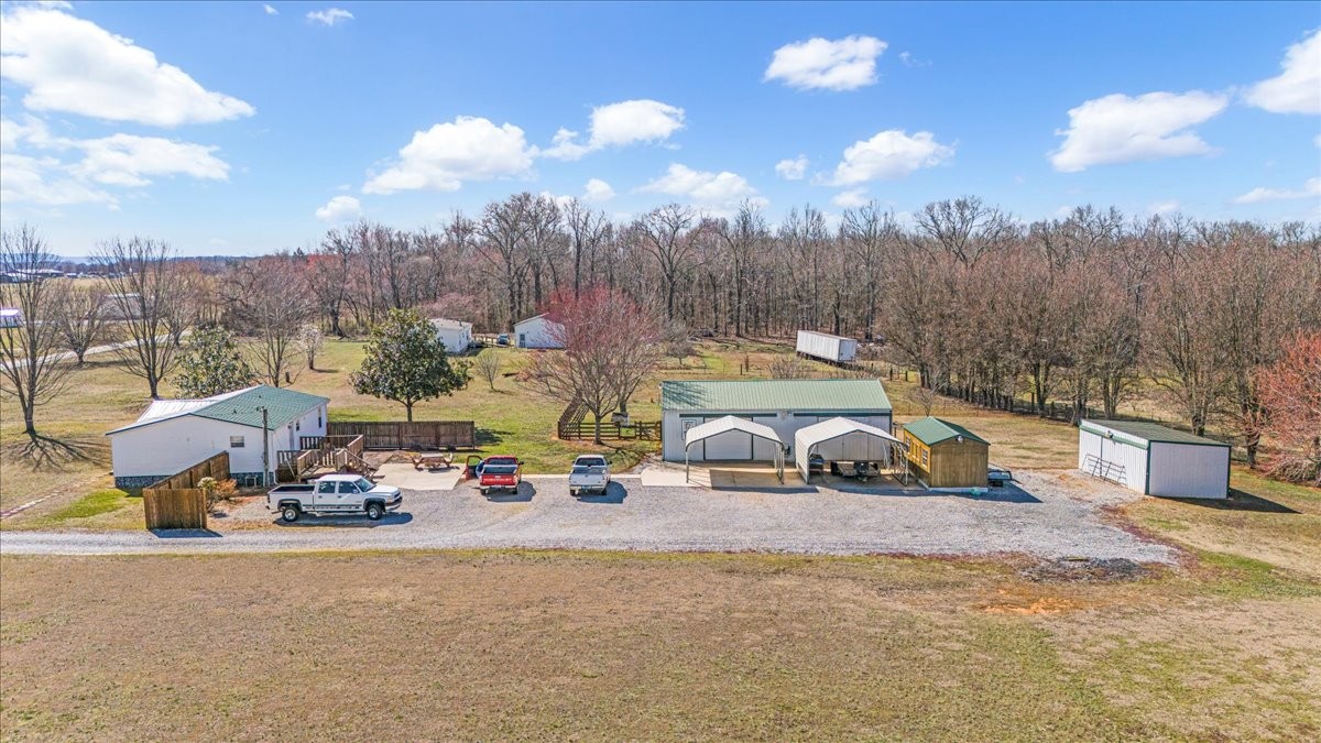 1175 Caney Branch Road Morrison, TN 37357 - Photo 1 of 52 a view of a swimming pool and lounge chairs