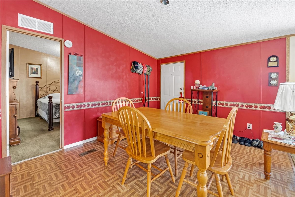 1175 Caney Branch Road Morrison, TN 37357 - Photo 11 of 52 a view of a dining room with furniture and chandelier