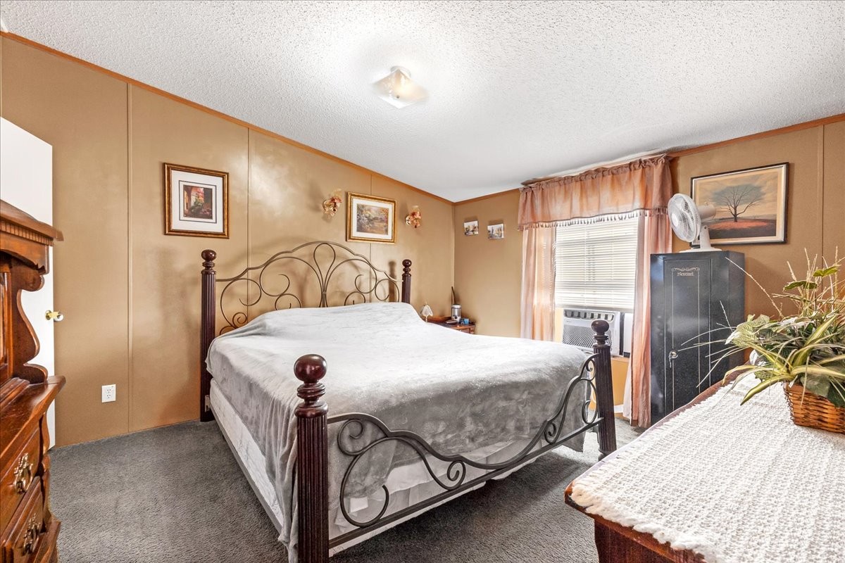 1175 Caney Branch Road Morrison, TN 37357 - Photo 24 of 52 a bedroom with a bed and wooden floor
