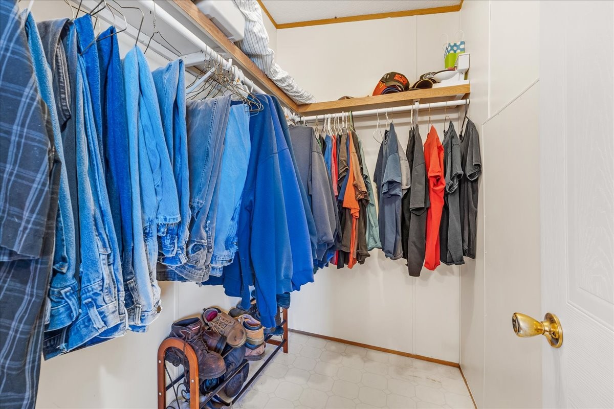 1175 Caney Branch Road Morrison, TN 37357 - Photo 29 of 52 a view of walk in closet with clothes