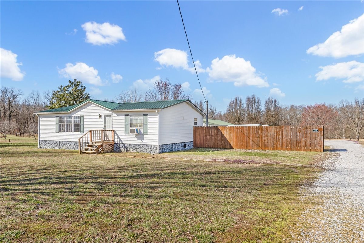 1175 Caney Branch Road Morrison, TN 37357 - Photo 3 of 52 a view of a house with a yard
