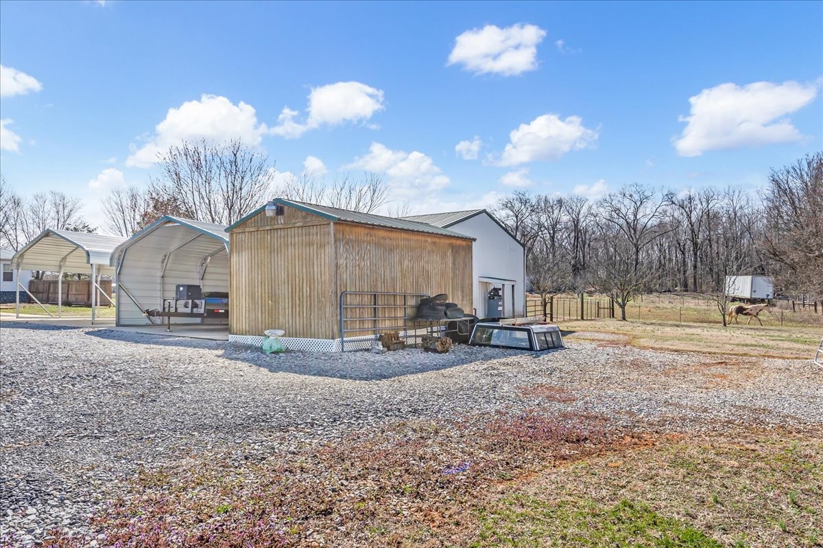 1175 Caney Branch Road Morrison, TN 37357 - Photo 49 of 52 a view of a house with a yard