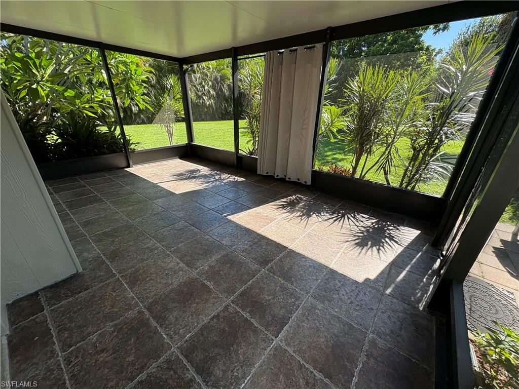 203 Esther Street Naples, FL 34104 - Photo 15 of 33 View of unfurnished sunroom